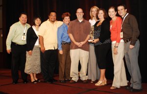 Representatives from Best Buy accept their award hmprhispretaward2.jpg