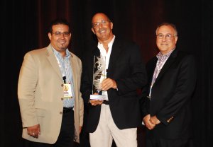 Roger Gonzalez of AARP, Mark Banister of Longs Drug, and Don Longo with Nielsen hmprhispretawardLongsaarp.jpg